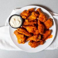 Buffalo Wings · Served with blue cheese on the side.
