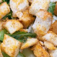 Caesar Salad · Romaine lettuce, grated cheese, croutons.