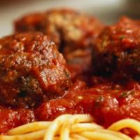 Pasta With Meatball · Served with homemade sauce, garlic bread and dinner salad.