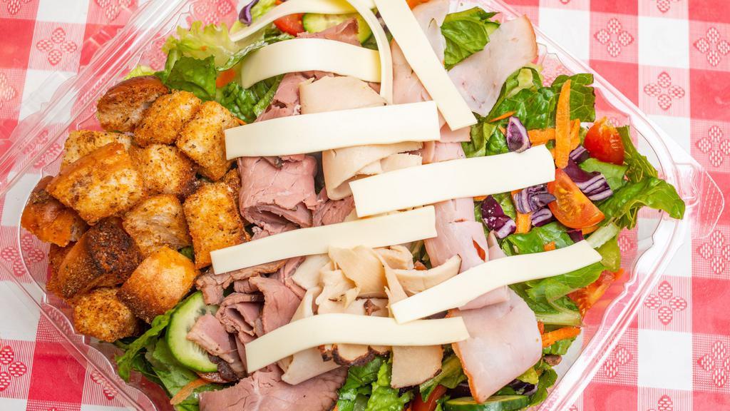 Chef Salad · Romaine, Salad Veggies, Roast Beef, Tavern Ham, Turkey, American Cheese.