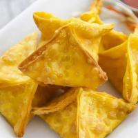Crab Rangoon · Recommended. Stuffed with imitation crabmeat, cream, cheese, onion carrot served with sweet ...