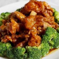 General Tso'S · Crispy chicken stir-fried with Tso's sauce top with sesame and broccoli on the side.