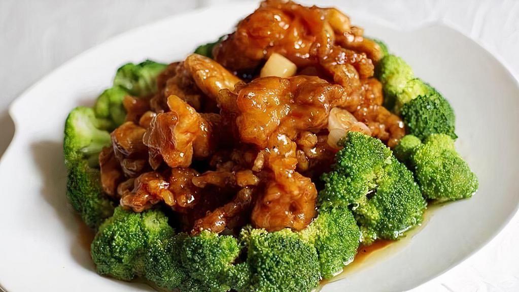 General Tso'S · Crispy chicken stir-fried with Tso's sauce top with sesame and broccoli on the side.