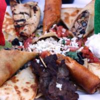 Ap: Fiesta Platter · Charbroiled chicken and steak skewers, Mex rolls, cheese quesadilla, chicken flautas, with c...