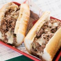 Cheesesteak · Sliced ribeye with your choice of cheese and topping.