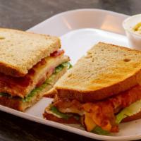 Bacon Turkey Cheddar Melt · Turkey, lettuce and tomatoes, cheddar, bacon melted on your choice of bread.