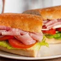 Ham & Cheese · Lettuce, tomatoes, ham and mayonnaise, choice of cheese, choice of bread.