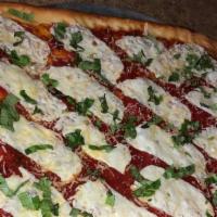 Brooklyn Style Sicilian Pizza · Thin crust with light tomato sauce, oil, fresh basil & mozzarella.