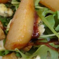 Roasted Pear Salad · Vegetarian. Port poached pears, blue cheese crumbles, toasted walnuts, grilled red onion, ar...