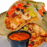 Chicken Tender Wrap · Juicy, house-made chicken breast tenders with black beans, shredded cheese, lettuce, and pic...
