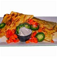 Chicken Quesadilla · Tender and juicy grilled chicken breast with provolone, tomato, and onion with sour cream an...