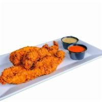 Chicken Tenders · We use house-made tempura batter and serve with honey dijon mustard.