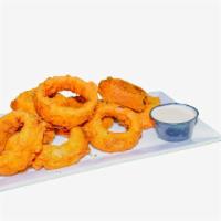 Full Basket Of Onion Rings · Fresh hand cut,d eliciously crunchy, battered, and fried onion rings.