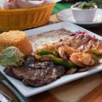 Tres Amigos · Charbroiled skirt steak with marinated grilled chicken breast and shrimp sauteed with mushro...