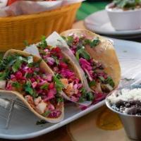 Mercado Tacos · Grilled chicken with melted Jack cheese and caramelized onions. Topped with pico de gallo an...