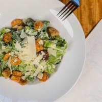 Caesar Salad · Gluten-free. Hearts of romaine, shaved pecorino cheese, homemade Caesar dressing, croutons, ...
