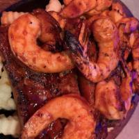 Snack Attack · A junior rack of baby backs, chicken cutlets and shrimp, cooked in b.b.q. Sauce and served o...