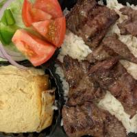 Steak Tip Platter · Sirloin tips served over rice with sides of hummus and salad.gluten free