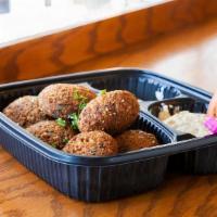 Falafel Platter · Falafel balls with turnip and radish, baba ghanouj and tahini sauce. Vegan. gluten free
