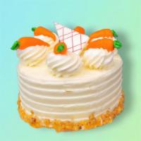 Carrot Cake Torte · Traditional carrot spice cake with cream cheese frosting. Contains nuts.