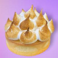 Lemon Meringue Torte · Tart lemon curd topped with a cloudlike meringue, served in a pastry shell.