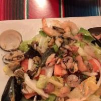 Mixed Salad · Mixed greens, queso fresco, avocado, romaine lettuce, tomatoes, radish, onion tossed with oi...
