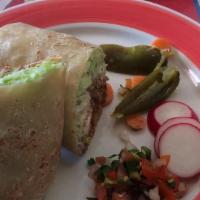 Pastor Burrito · Achiote juajillo paste orange and pineapple marinated pork, rice, beans, lettuce, sour cream...