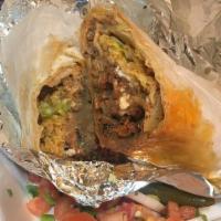 Burrito Carnitas · Braised Pork shoulder, rice, beans, lettuce, sour cream, and Oaxaca cheese