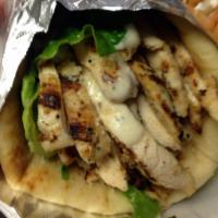 Chicken Caesar Gyro · Grilled chicken chopped iceberg lettuce, Caesar dressing, Parmigiano cheese all wrapped in t...