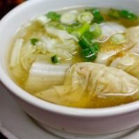 Wonton Soup · A delicate mixture of shrimp and chicken in a clear light broth soup.