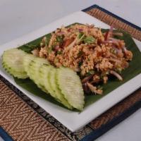 Larb Salad · Your choice of minced chicken, beef, or pork tossed with chili, onions, and lime juice.