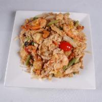 Pineapple Fried Rice · Traditional fried rice with sweet pineapple, roasted cashew nuts, onions, scallions, raisins...