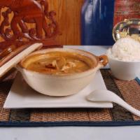 Yellow Curry · Massaman curry paste blended with coconut milk, potatoes, carrots, onions, and pineapples. A...