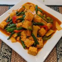 Spicy Tofu (Pad Pet Tofu) · Fried spicy tofu sauteed with fresh basil leaves, thai chili, and garlic.