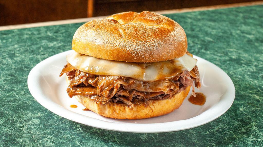 Roast Beef & Cheese · Hand carved slow roasted USDA PRIME roast beef sandwich with aged sharp provolone cheese, served on a fresh baked Liscio's Kaiser roll with homemade gravy.