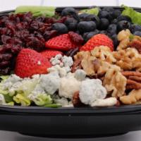 Nuts & Berries Salad · Green leaf lettuce, carrots, walnuts, blueberries, strawberries, raspberries, blue cheese. (...