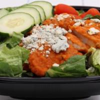 Buffalo Chicken Salad · Green leaf lettuce, tomato, breaded buffalo chicken breast, blue cheese, celery. (Dressing n...