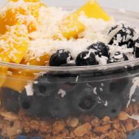 Oasis Bowl · Toppings: Granola, Mango, Coconut Flakes, and Blueberries.