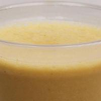 Golden Turmeric · Coconut Milk, Pineapple, Banana, Ginger, and Turmeric.