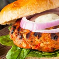 Classic Salmon Brioche Burger · Delicious Salmon Burger freshly prepared and cooked to perfection. Served on a Brioche bun w...