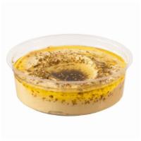 Hummus With Za'Atar And Olive Oil · House made Silky Hummus, Za'atar,  and Olive Oil