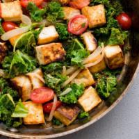 Tofu & Kale Salad · Kale salad topped with fried tofu, dried cranberries, almond slices in soy vinegar dressing.