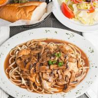 Chicken Marsala · Boneless chicken breast sauteed with fresh herbs, mushrooms and marsala wine, served with si...