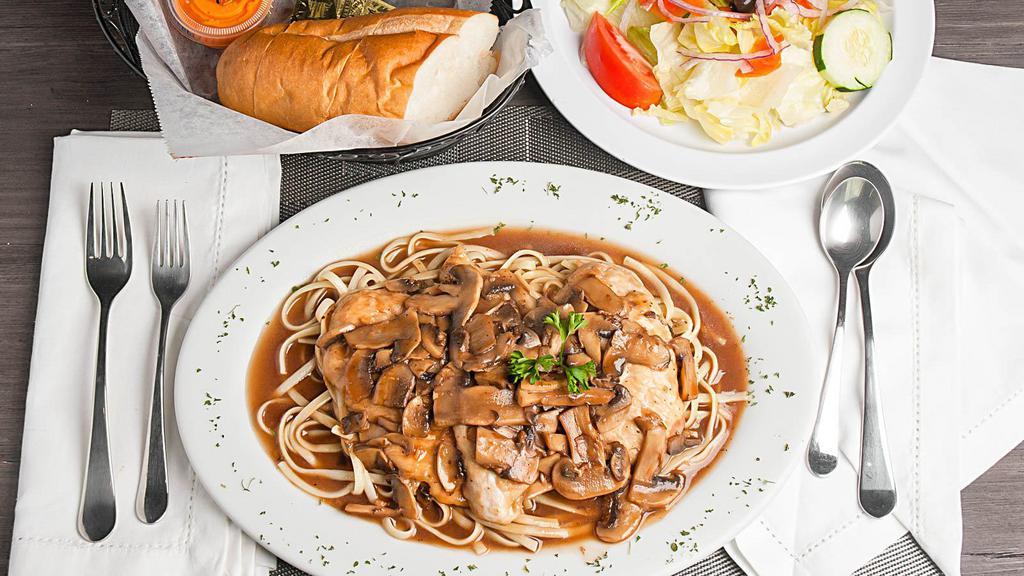 Chicken Marsala · Boneless chicken breast sauteed with fresh herbs, mushrooms and marsala wine, served with side of pasta.