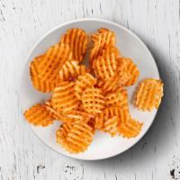 Spicy Waffle Fries · waffle fries dusted with a spicy seasoning