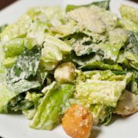 Caesar · Gluten-free option available upon request. A Classic Caesar, Focaccia Croutons, Parmigiano-R...