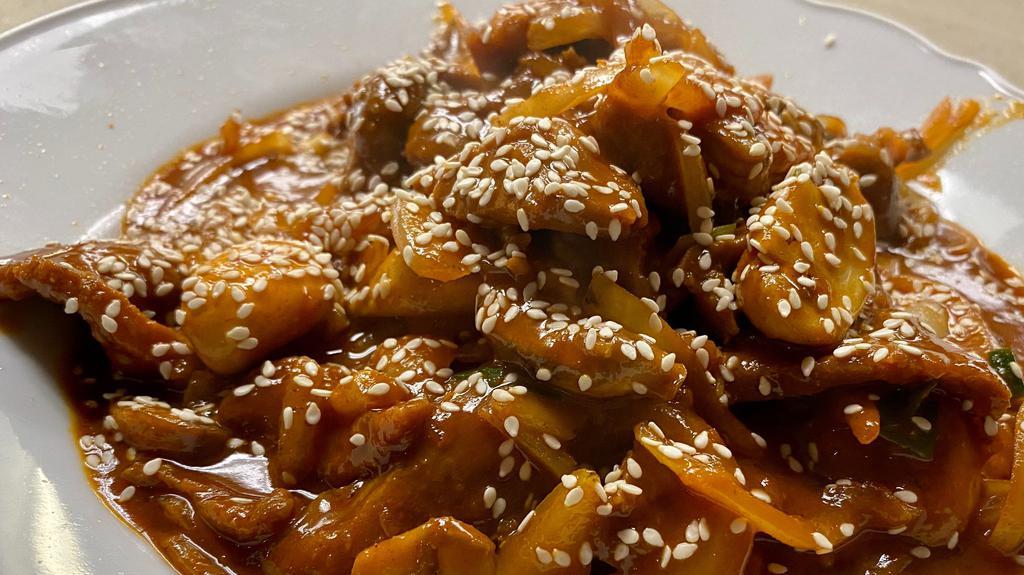 Deji Bulgogi* · Spicy Korean pork. White mushrooms, onions, scallions, and sesame seeds