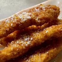 Coconut Chicken Fingers · Crispy chicken tenders sprinkled with coconut flakes