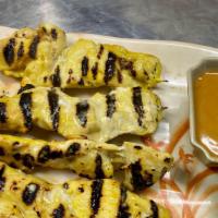 Satay · Choice of grilled chicken or beef on skewers served with peanut sauce
