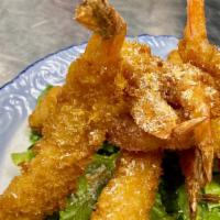 Coconut Shrimp Tempura · Crispy shrimp tempura sprinkled with coconut flakes